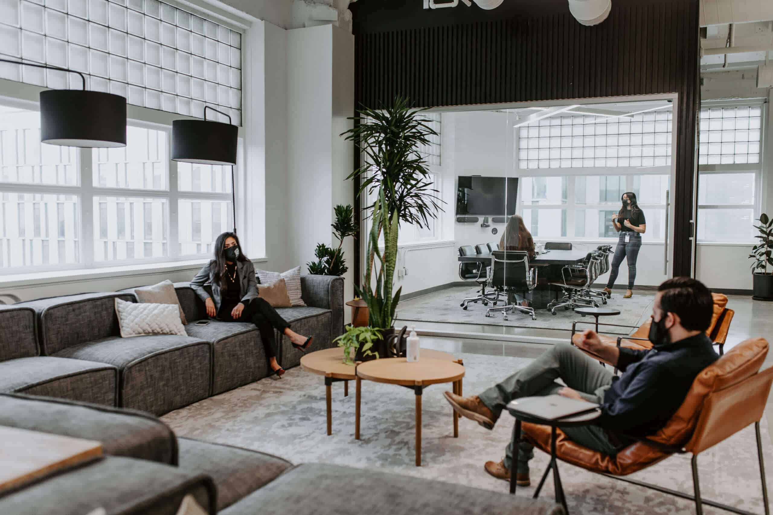 Justice HQ members in DTLA lounge and conference room